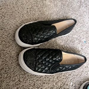 Girl’s Steve Madden slip-on shoes.